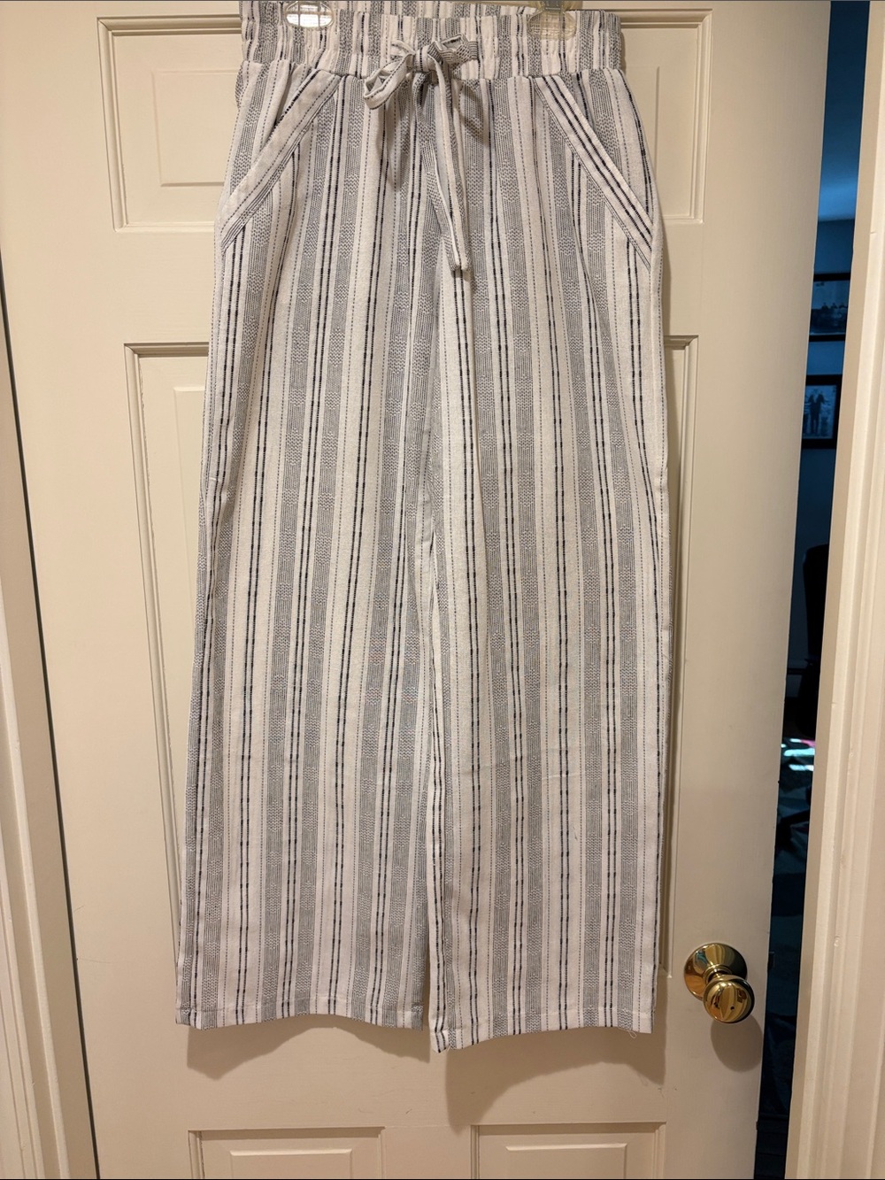 Sienna Sky White and black Vertical Stripe pants.